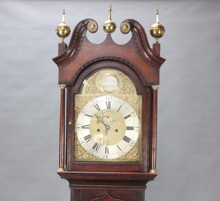 John Lovejoy, an 18th Century 8 day striking longcase clock, the 31cm gilt arched dial marked Lovejoy Havant, with silvered chapter ring, subsidiary second hand and calendar aperture, contained in a carved oak case complete with weights, key and pendulum, contained in an oak case  225cm h 