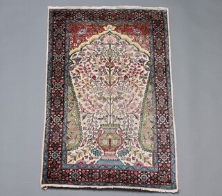A North West Persian silk, white, green and red ground prayer rug 117cm  x 77cm 
