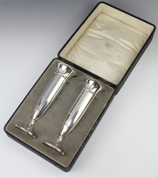 A pair of panelled silver posy vases Birmingham 1928, maker AD Brothers, 21cm, in a fitted case 