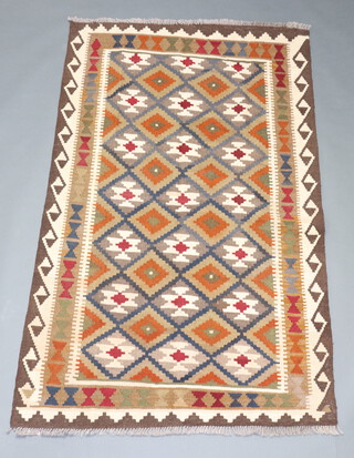 A brown, black and white ground, Maimana Kilim with overall geometric design 193cm x 124cm 
