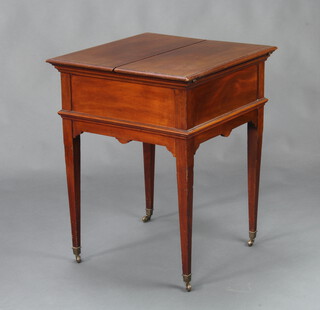 Alexander Clark, a 1920's square mahogany surprise table with hinged lid, raised on square supports ending in brass caps and ceramic casters 76cm h x 58cm w x 61cm d 