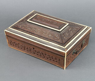 A 19th Century Indian carved hardwood and inlaid ivory trinket box with hinged lid 11cm h x 30cm w x 20cm d