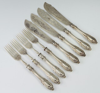 A set of Victorian silver fish eaters with lily pattern handles and engraved blades, London 1861, gross weight 526 grams 