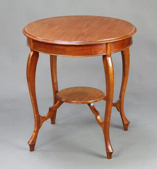 An Edwardian circular oval 2 tier occasional table raised on cabriole supports 73cm h x 67cm diam. 