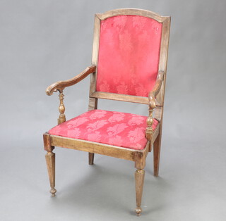An Italian walnut showframe open armchair, the seat and back upholstered in red material, raised on square tapered supports 105cm h x 59cm w  50cm d (seat 33cm x 32cm) 