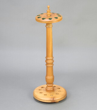 A 20th Century Victorian style turned oak 10 aperture snooker cue stand with turned finial 80cm x 28cm 
