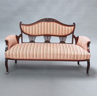 An Edwardian 7 piece salon suite upholstered in Regency stripe material comprising 3 seat sofa 87cm h x 150cm w x 58cm d (seat 115cm x 50cm), pair of open arm chairs 93cm h x 54cm w x 47cm d (seats 30cm x 32cm) and 4 standard chairs 87cm h x 45cm w x 36cm d (seats 28cm x 30cm), raised on cabriole supports  