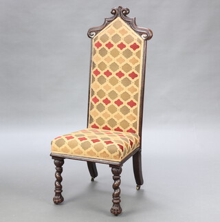 A Victorian Gothic style oak show frame hall/nursing chair the seat and back upholstered, raised on turned supports 120cm h x 48cm w x 45cm d (seat 26cm x 27cm)  