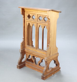 A Victorian style carved pitch pine ecclesiastical lectern 117cm h x 66cm w x 49cm d 