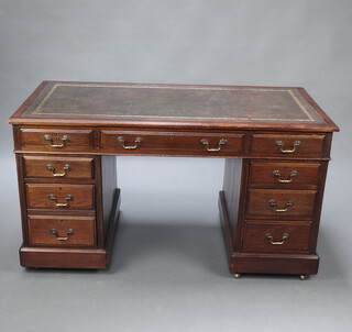 A mahogany desk with inset leather writing surface fitted 1 long and 8 short drawers 70cm h x 139cm w x 71cm d 