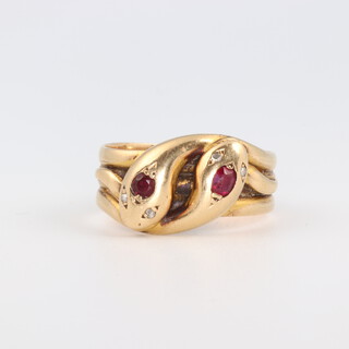 A Victorian 18ct yellow gold ruby and diamond double snake ring 7.5 grams, size Q 1/2