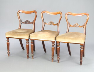 A set of 3 Victorian carved walnut spoon back dining chairs with carved mid rails and over stuffed seats raised on turned supports 79cm h x 46cm w x 41cm d (seat 30cm x 30cm) 