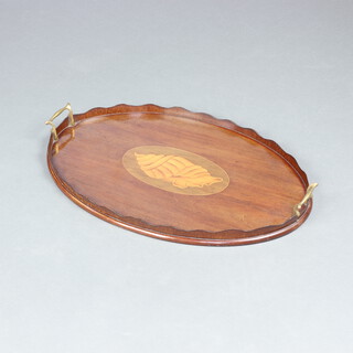 An Edwardian oval inlaid mahogany twin handled tea tray decorated a shell 6cm x 58cm x 38cm 