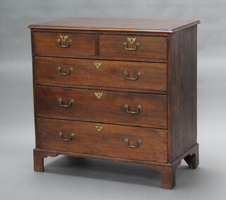 An 18th Century oak chest of 2 short and 3 long drawers, raised on bracket feet with replacement brass swan neck drop handles 103cm h x 102cm w x 57cm d 
