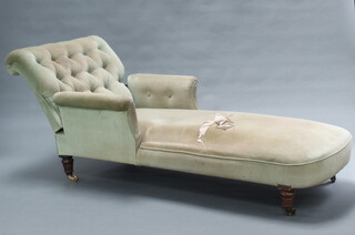 Bertram & Sons, a Victorian reclining daybed upholstered in green buttoned material, having a brass ratchet adjustment to the side, raised on turned supports, caps and casters marked Bertram & Sons, 75cm h x 124cm w x 79cm d 