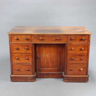 A Victorian mahogany pedestal dressing table  fitted 1 long and 8 short drawers with tore handles, the pedestal enclosed by a panelled door 76cm h x 121cm w x 62cm d 