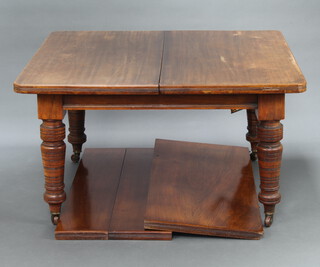 A Victorian mahogany extending dining table with 3 extra leaves, raised on turned supports ending in ceramic casters 73cm h x 121cm w x 130cm l x 239cm l when extended 
