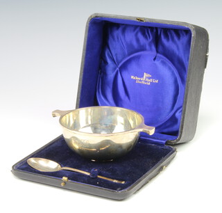 A silver quaich with engraved monogram and date 1928 together with a spoon Sheffield 1927/1929, cased 190 grams 