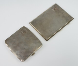 A silver engine turned cigarette case Birmingham 1926, a ditto 1946, 306 grams gross 