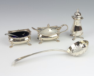A matched silver 3 piece condiment with hoof feet Birmingham 1957, 58 and 59, together with a Georgian silver bottom marked sifter spoon 198 grams 
