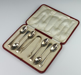 A set of 6 Edwardian silver teaspoons and tongs with engraved monogram Sheffield 1907, 180 grams, cased 
