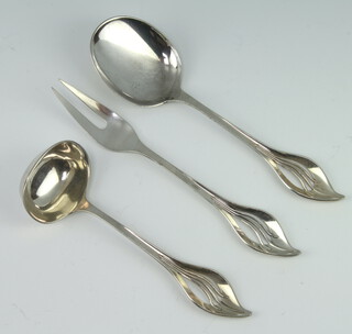 A stylish Danish sterling silver ladle, spoon and fork with pierced handles 120 grams 