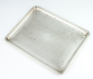 A rectangular silver engine turned dressing table tray, London 1913, 524 grams, 27.5cm x 21.5cm
