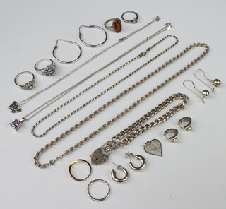 A silver bracelet and minor silver jewellery 82 grams