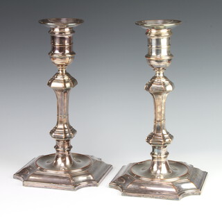 A pair of impressive Georgian style silver plated candlesticks with octagonal stems 34cm 