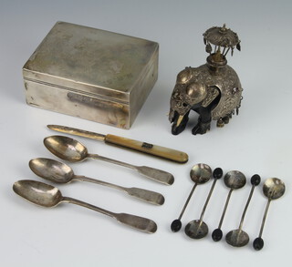 A Victorian silver rectangular cigarette case London 1899, 11.5cm x 9cm (dented), a silver fruit knife, minor spoons and a white metal mounted ebony elephant