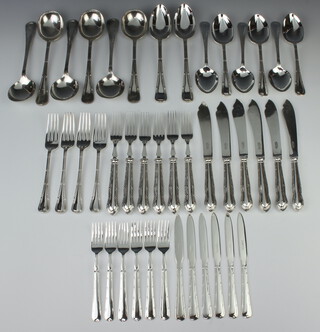 A set of silver plated ribbon and bow cutlery comprising 6 cake knives and forks, 6 fish knives and forks, 6 soup spoons, 6 dessert spoons, 2 serving spoons and 4 dessert forks 