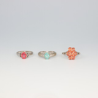 Three 18ct white gold gem set rings, size I, L and M, 9.5 grams gross 