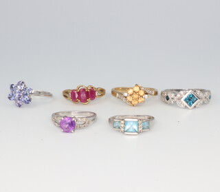 Four 9ct white gold gem set rings, 2 9ct yellow gold ditto, sizes I, I, I, J, N, and O, 13.8 grams 