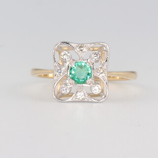 A yellow metal, Edwardian style, emerald and diamond cocktail ring, 2.3 grams, size O