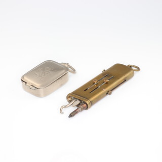 A brass cased etui together with a cased seal 
