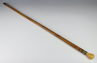 A Regency walking cane with ivory knop