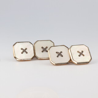 A pair of Edwardian 9ct yellow gold mother of pearl cufflinks 6 grams gross