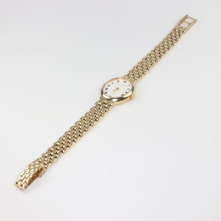 A lady's 9ct yellow gold oval Bueche Girod wristwatch on a ditto strap no.802000628020, gross weight 26 grams 