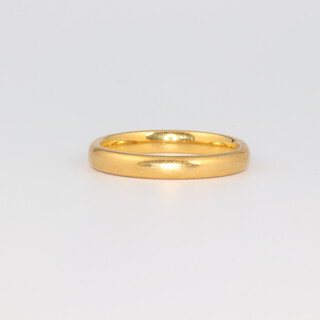 A 22ct yellow gold wedding band, size N, 4.7 grams 