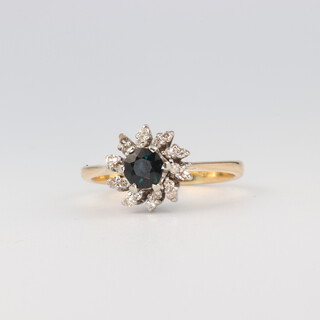 An 18ct yellow gold sapphire and diamond ring, 3.3 grams, size L 