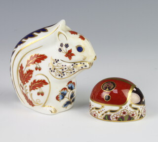 A Royal Crown Derby Imari pattern paperweight in the form of a squirrel with silver stopper 9cm, a ditto of a Ladybird with silver stopper 5cm 