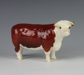 A Beswick Hereford Cow no.1360 modelled by Arthur Greddington 10.8cm, brown and white gloss 