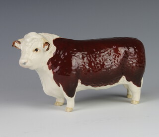 A Beswick Hereford Bull no.13638 modelled by Arthur Greddington 10.8cm, brown and white gloss 