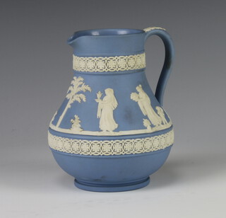 A Wedgwood blue Jasper jug decorated with band of classical figures 14cm 