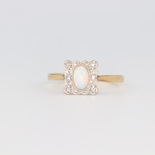 An Edwardian yellow metal opal and diamond square ring, the centre stone 0.5ct, size N, 2 grams 