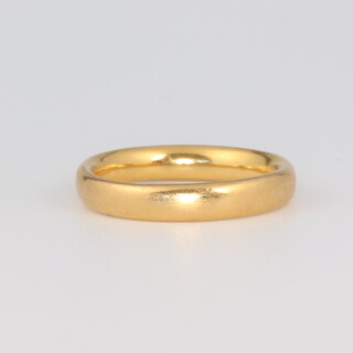 A 22ct yellow gold wedding band size J 1/2, 4.5 grams 
