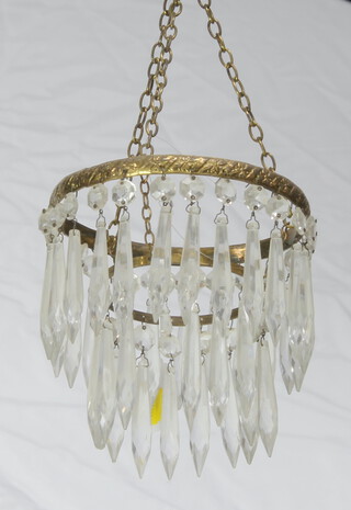 A circular gilt metal light fitting hung lozenges 16cm x 16cm, (some lozenges missing) 
 