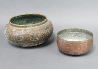 A circular Eastern brass bowl 15cm x 21cm, 1 other 9cm x 19cm 