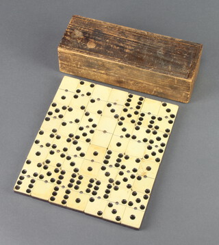 48 bone and ebony, for 6, dominoes, contained in a pine box (some chips to edges) 