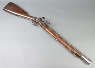 Francesco Gianinno Bargonone of Naples, a 17th/18th Century Italian blunderbuss with 51cm steel barrel and walnut stock, the barrel with 2 proof marks and 13 fleur de lis marks to the top of the barrel, the steel lock marked Francesco Gianinno Borgonone Napoli, the steel trigger guard decorated an eagle and the butt end portrait of a warrior surrounded by military trophies 89cm overall  